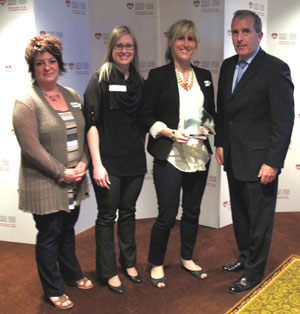 Members of WorkSafeNB&#x27;s regional Wellness Committees were on hand to accept this year&#x27;s Gold Wellness at Heart Award. Pictured, from left to right, is Sandra Soucy, northwest region, Véronique Bourque, northeast region, Nadine M. Cormier, southeast region, and Dan Connolly, CEO of the Heart and Stroke Foundation of New Brunswick.