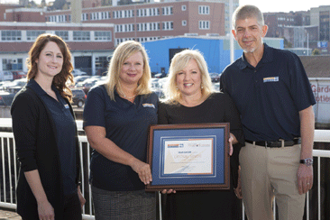 From left: Jessica MacDonald, business and community Eegagement co-ordinator, WorkSafeNB; Shelly Dauphinee, vice-president of WorkSafe Services, WorkSafeNB; Lindsay Savoie, Champlain Heights School; and Tim Petersen, acting president and CEO, WorkSafeNB.