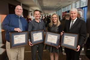 WorkSafeNB announced the recipients of its 2018 Safety Star Awards at its annual Health and Safety Conference in Fredericton on Friday, October 5. From left: <b>Benjamin Kelly</b>, Health and Safety Educator Award (anglophone) recipient, Caledonia Regional High School; <b>Ricky Laboissonnière</b>, Health and Safety Educator Award (francophone) recipient, École Louis-J.-Robichaud; Nikol Ralcheva, Health and Safety Leader Award, Fredericton Multicultural Association; <b>Peter Morgan</b>, Health and Safety Champion Award recipient, City of Saint John. <i>Photo: Stephen MacGillivray/For WorkSafeNB</i>